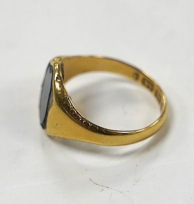 A George V 18ct gold and bloodstone set signet ring, size M, gross weight 4.1 grams. Condition - poor